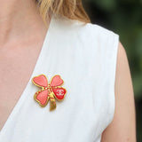 CHANEL clover brooch, pink enamel petals with gold-tone trim and pin-back