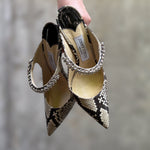 Snake-print heeled mules with rhinestone trim, open back, pointed toe