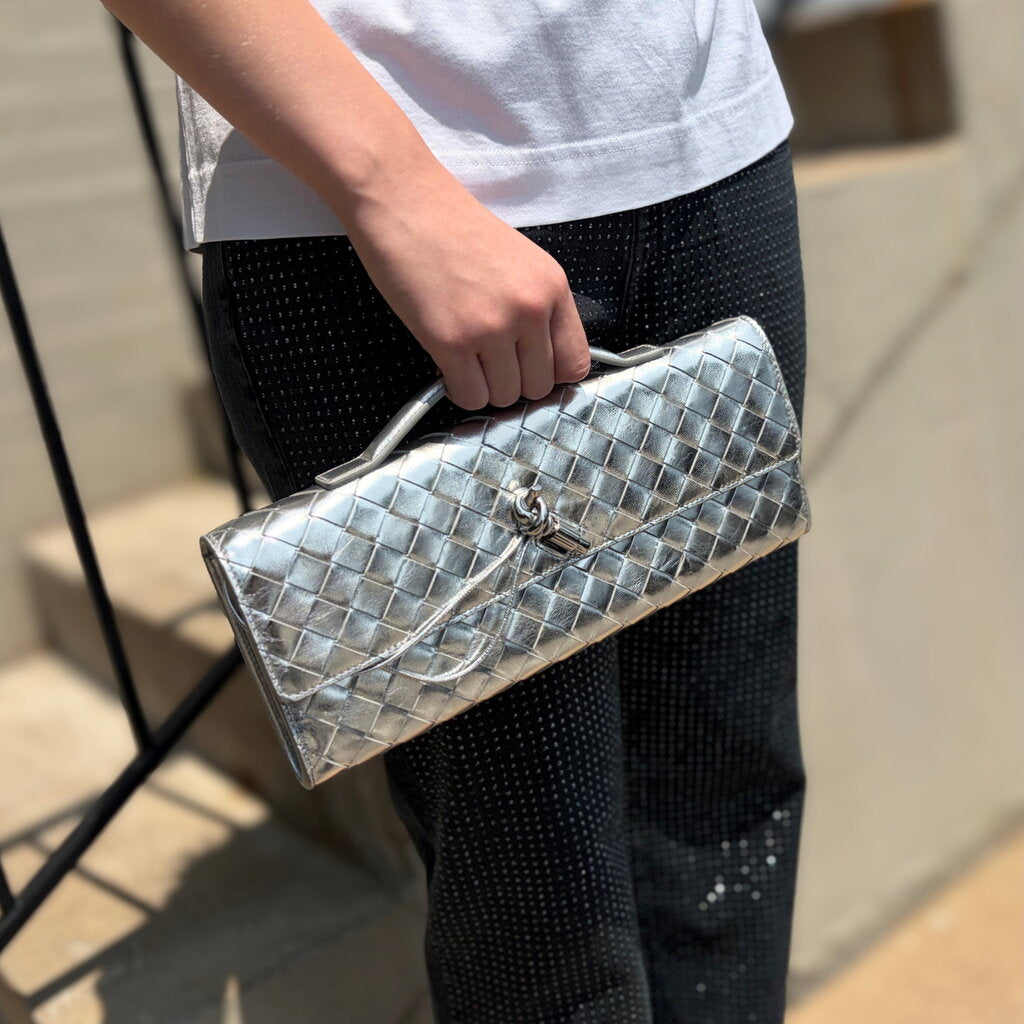 Bottega Veneta Andiamo clutch in silver with top handle and front clasp