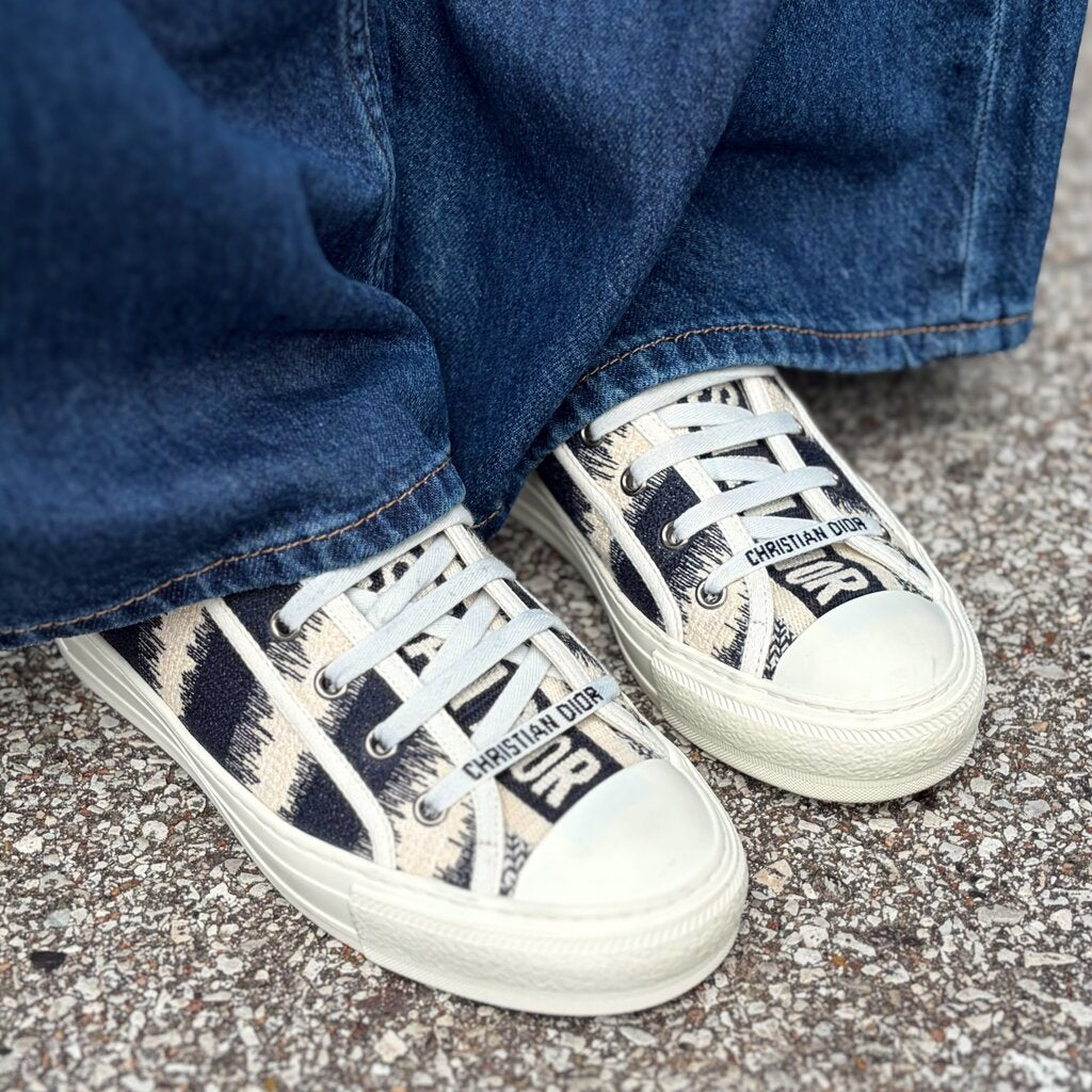 Dior low-top sneakers, black and cream stripe panels, lace-up and logo details