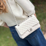 Quilted medium double-flap shoulder bag in light chalk with silver chain strap and CC logo