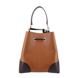 Brown medium bucket crossbody with black colorblock panels and metal drawstring ring