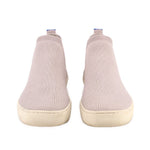 Pair of Chelsea ankle booties with light gray knit uppers and beige rubber soles