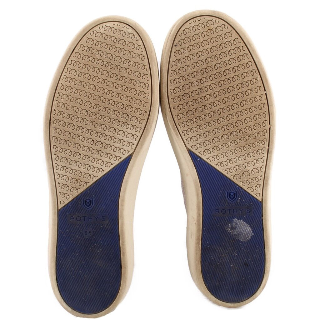 Chelsea ankle booties outsoles with tread pattern and beige rubber bottoms