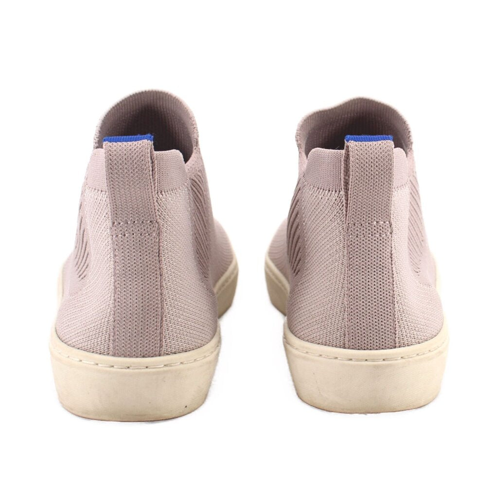 Back view of Chelsea ankle booties with light gray knit fabric and beige soles