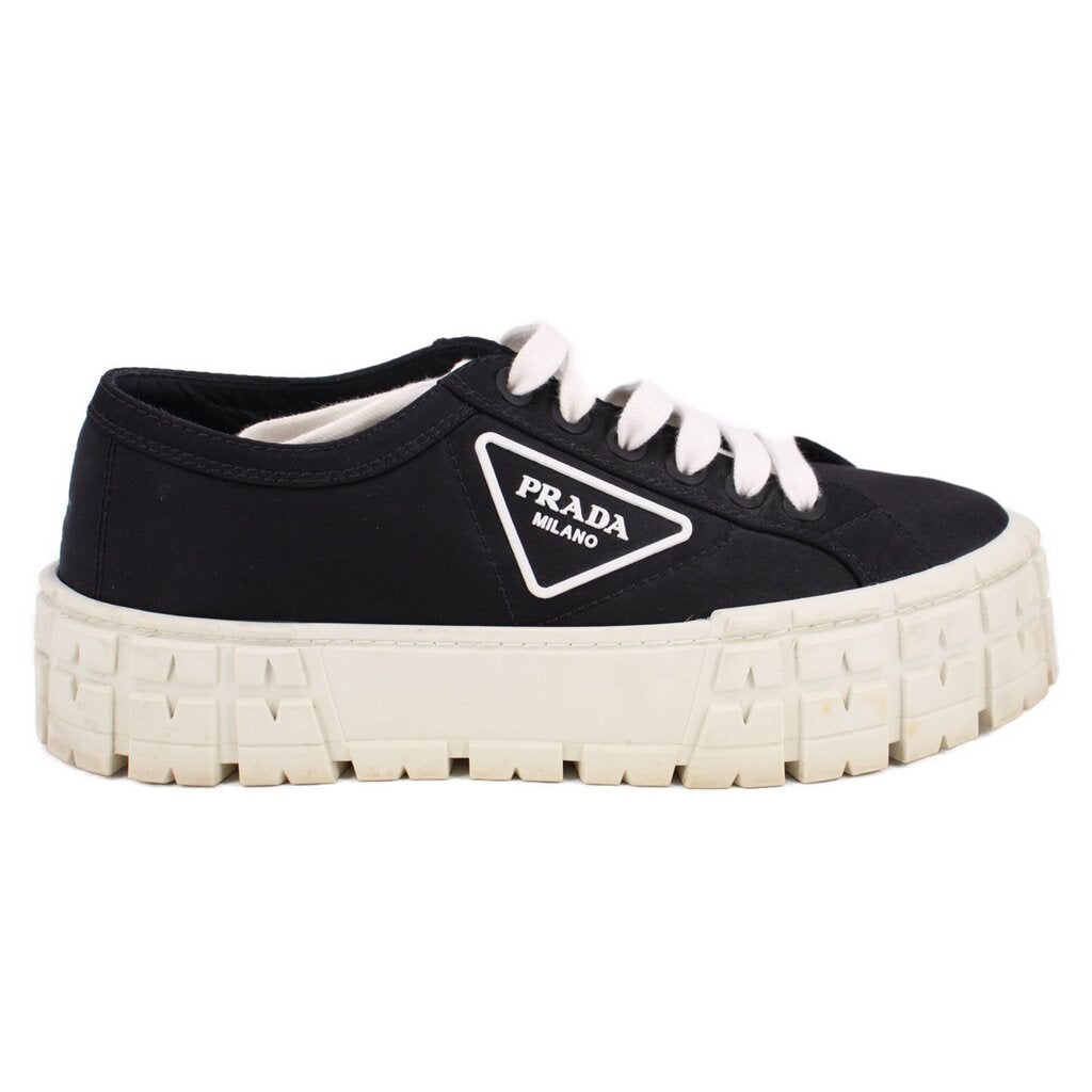 Prada black platform sneakers with PRADA logo patch and chunky light sole
