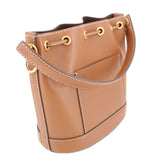 TORY BURCH T MONOGRAM BUCKET CROSSBODYS TAN