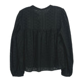 Black eyelet top with rounded yoke and long puff sleeves