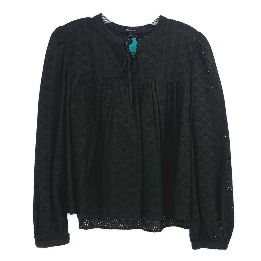 Black eyelet top with keyhole neckline and pintuck detail, long puff sleeves