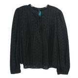 Black eyelet top with keyhole neckline and pintuck detail, long puff sleeves