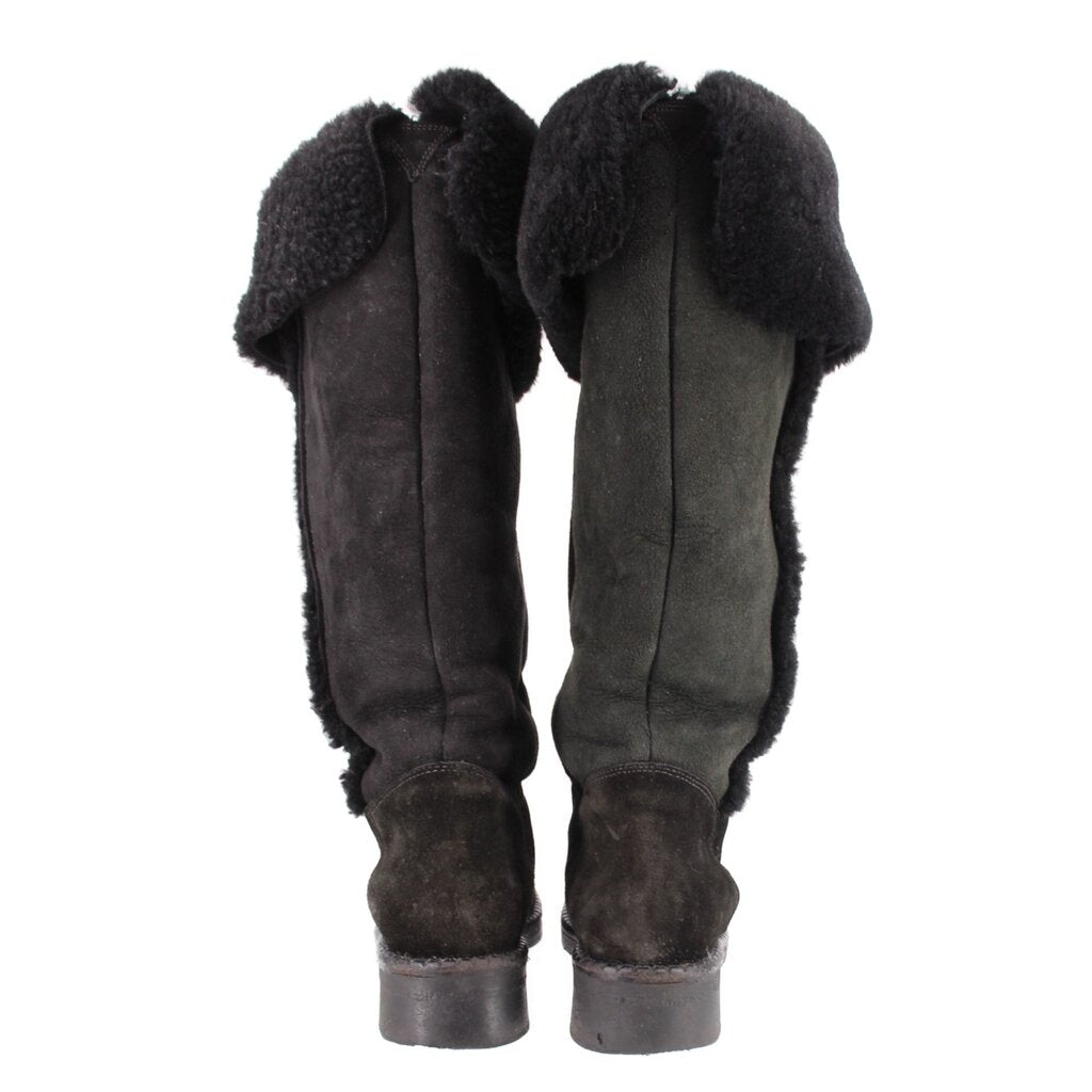 Black shearling suede tall boots, rear view with plush lining and seam details