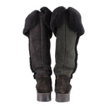 Black shearling suede tall boots, rear view with plush lining and seam details