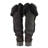 Black shearling suede tall boots, rear view with plush lining and seam details