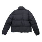 Reversible puffer outerwear back view, dark quilted shell, zip front, hood
