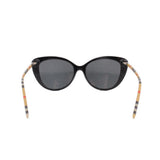 Cat-eye sunglasses, black front with check-pattern temple arms and dark lenses