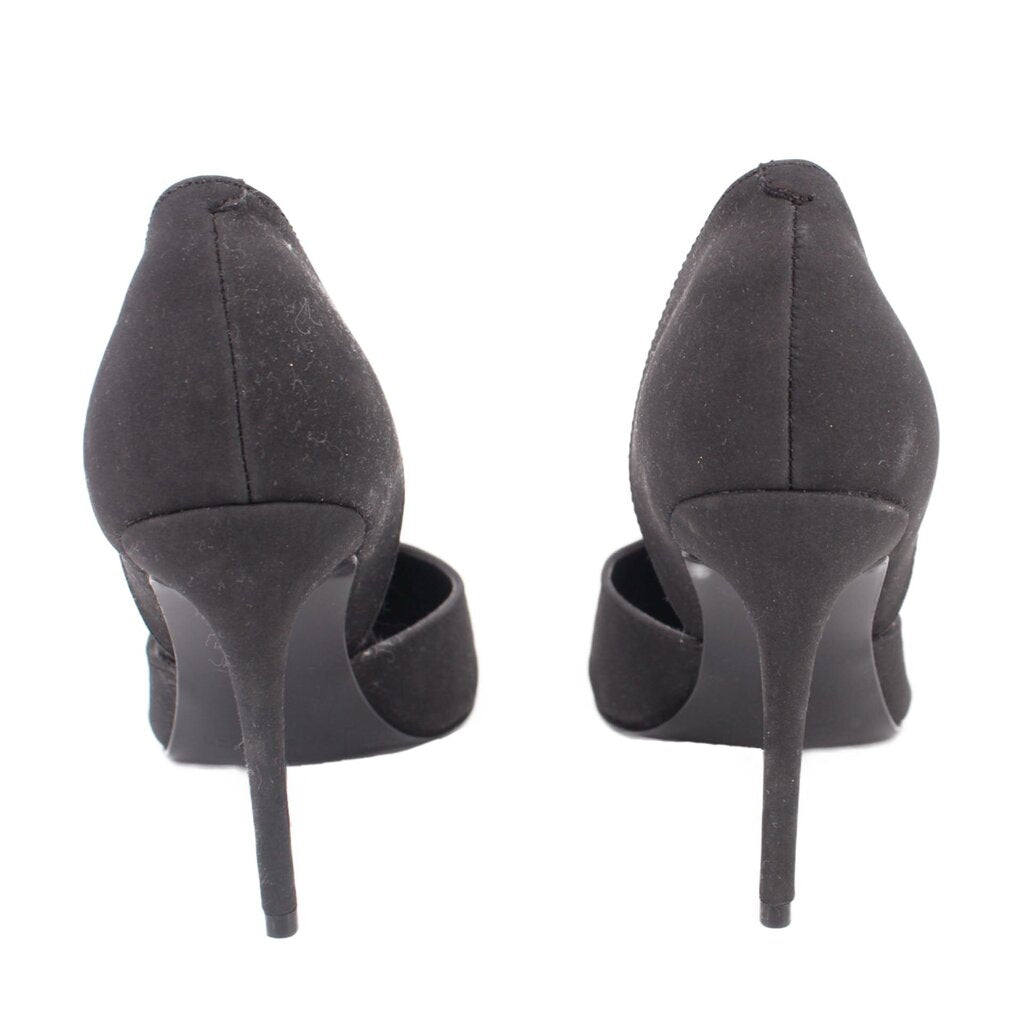 Black fabric pointed-toe stiletto heel pumps, back view with slender heel.