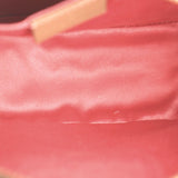 Red fabric lining inside GUCCI velvet crossbody bag