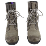 Pair of SOREL gray lace-up wedge booties shown from above