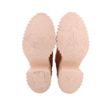 Nude platform boot soles with embossed AGL branding