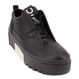 Black platform sneaker with lace-up front and cushioned collar