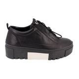 Black platform sneaker with lace-up closure and thick tread sole