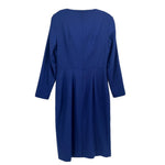 Navy long sleeve dress, back view with vertical seam and straight skirt hem