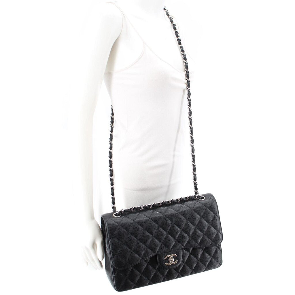 Black quilted jumbo double flap shoulder bag with CC logo on flap