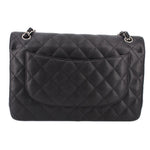 Black jumbo double flap shoulder bag, quilted back panel with flap pocket and top rings