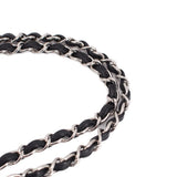 Black double flap shoulder bag chain detail with silver-tone links