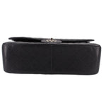 Black leather jumbo double flap bag with silver turn-lock on top edge