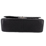 Black leather jumbo double flap bag with silver turn-lock on top edge