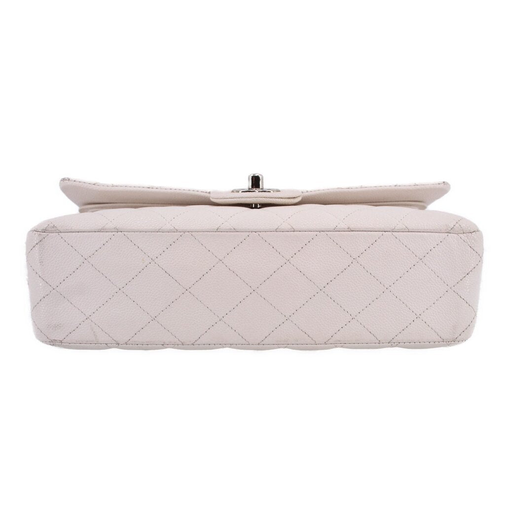Off-white CHANEL double flap shoulder bag back view with small top snap bar