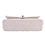 Off-white CHANEL double flap shoulder bag back view with small top snap bar