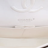CHANEL interior logo panel on chalk white double flap bag, with stitched opening