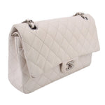 Light chalk quilted shoulder bag with silver chain strap and double-flap front