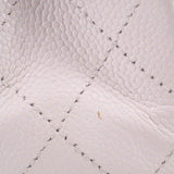 Chalk quilted leather panel detail with diamond stitching on handbag flap