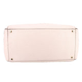 Cream leather Thatcher tote, bottom view with metal feet and reinforced base