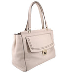 Cream leather Thatcher tote, front side view with flap pocket and gold turn-lock