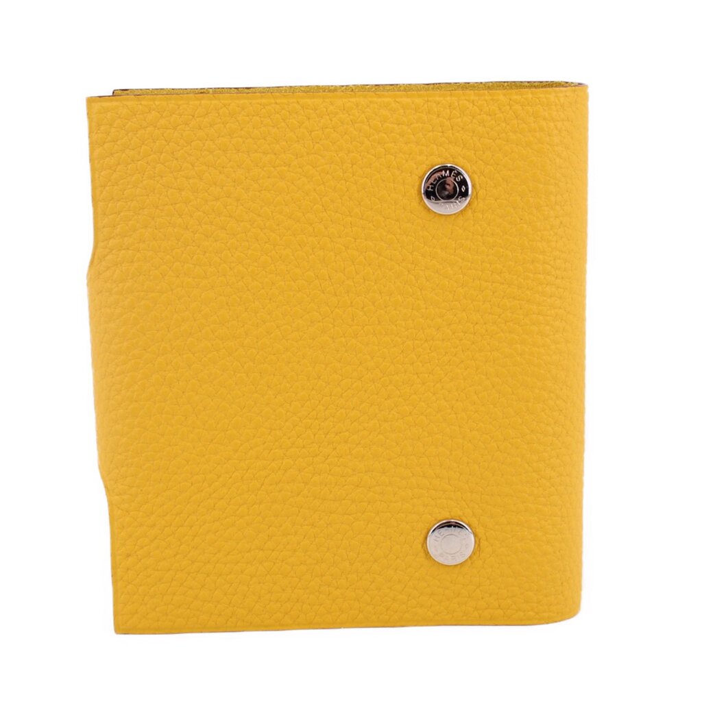 Yellow Ulysse PM notebook cover, front view with round metal button details