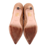 Camel suede ankle booties, view of insides with printed logo on lining.