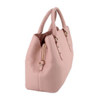 Pink satchel side view with front zip pocket, handles, and crossbody strap, gold hardware