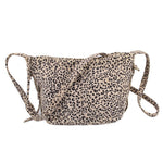 Leopard print mini leather crossbody bag with front panel seams and top zip closure