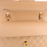 Open small double flap shoulder bag: top zip pocket and gold chain accents, tan