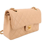 Tan quilted Small Double Flap shoulder bag, side view with flap clasp and gold chain handles