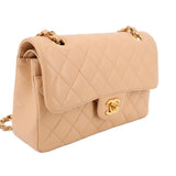 Tan quilted Small Double Flap shoulder bag, side view with flap clasp and gold chain handles