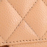 Tan quilted leather small double flap shoulder bag, stitched pattern detail