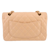 Tan quilted Small Double Flap shoulder bag back view with oval back pocket and gold chain rings