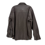 Dark leather jacket back view with yoke seam and long sleeves