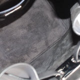 Navy bucket crossbody bag interior lining with stitched seam and hardware