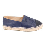 Blue espadrille flat with cap toe, logo embroidery, and jute rope midsole